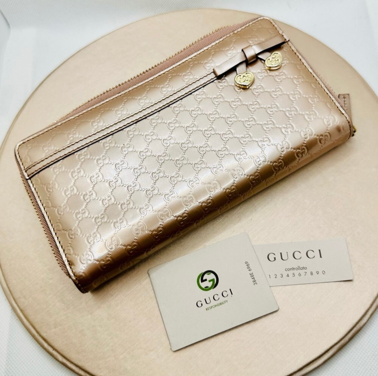 Gucci Bow Heart Zip Around Microguccissima Metallic Rose Gold Patent Leather Wallet