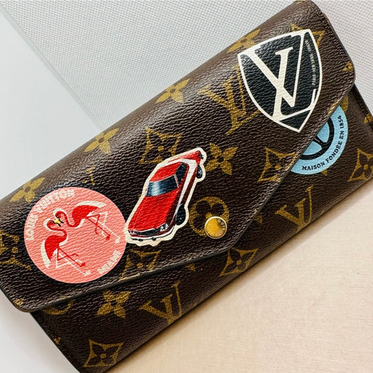 Louis Vuitton Monogram Limited Edition World Tour Sarah Wallet