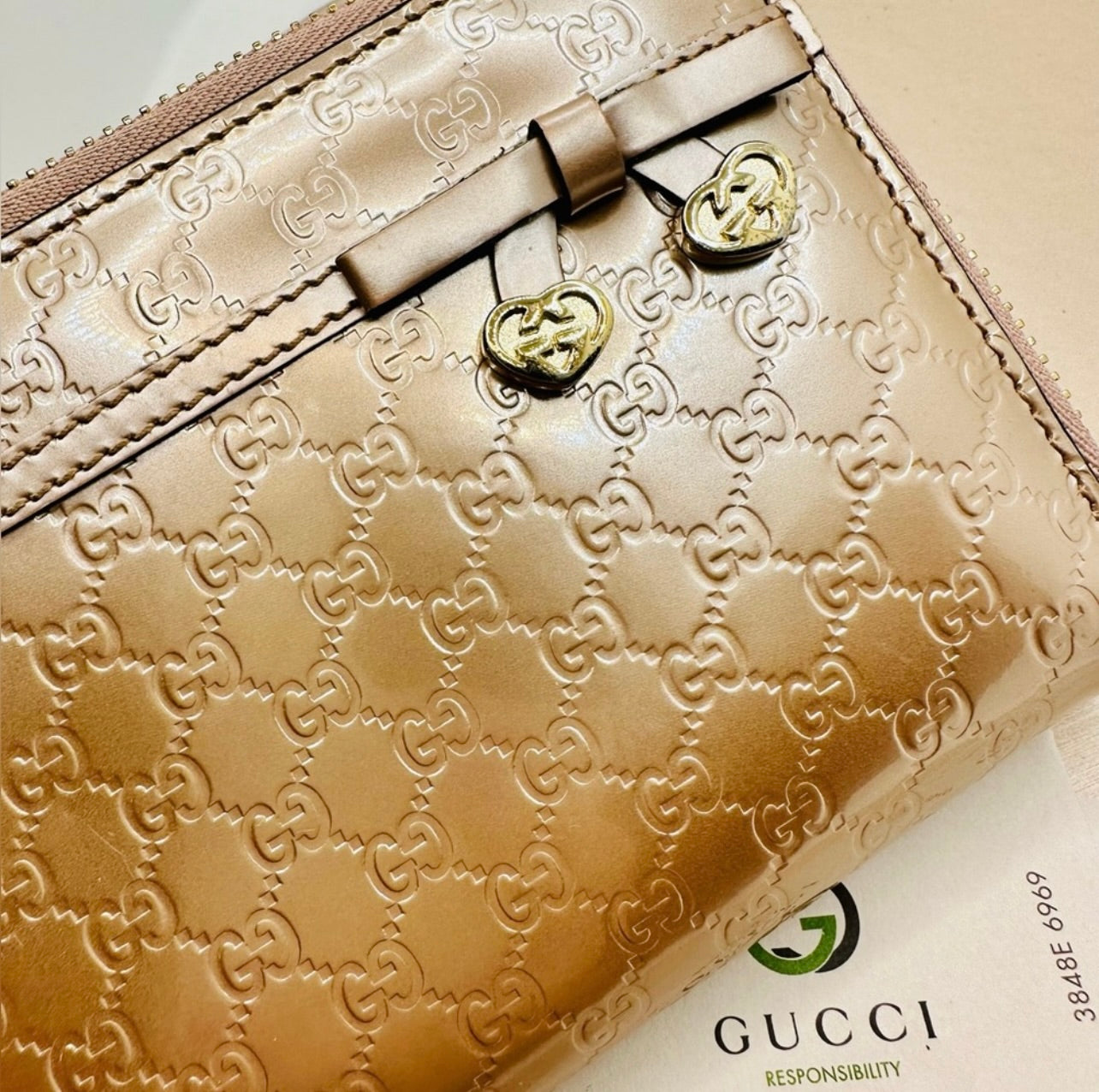 Gucci Bow Heart Zip Around Microguccissima Metallic Rose Gold Patent Leather Wallet